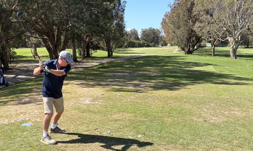 Dave Rosser looks to smack one up the shute on the par four 17th at The Island.